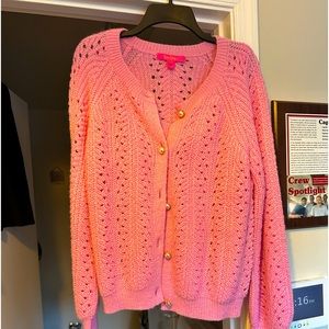 Gorgeous sweater and tank crop top with pearl like buttons.